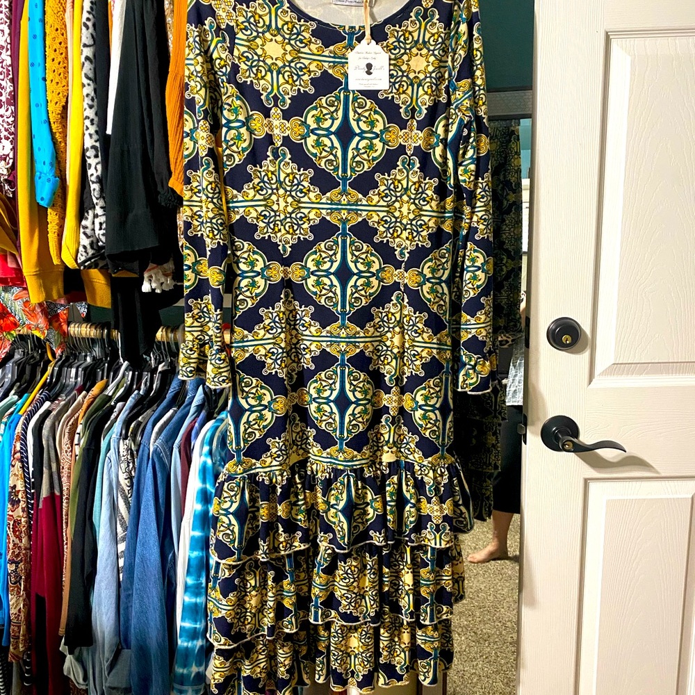 Dainty jewells dress. Never worn.
